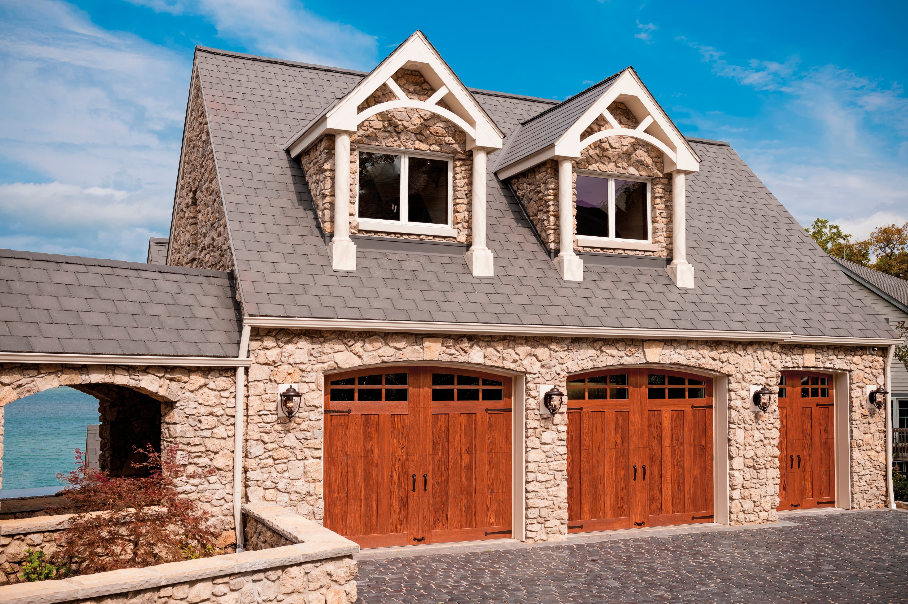 Canyon Ridge stone and wood luxury garage doors