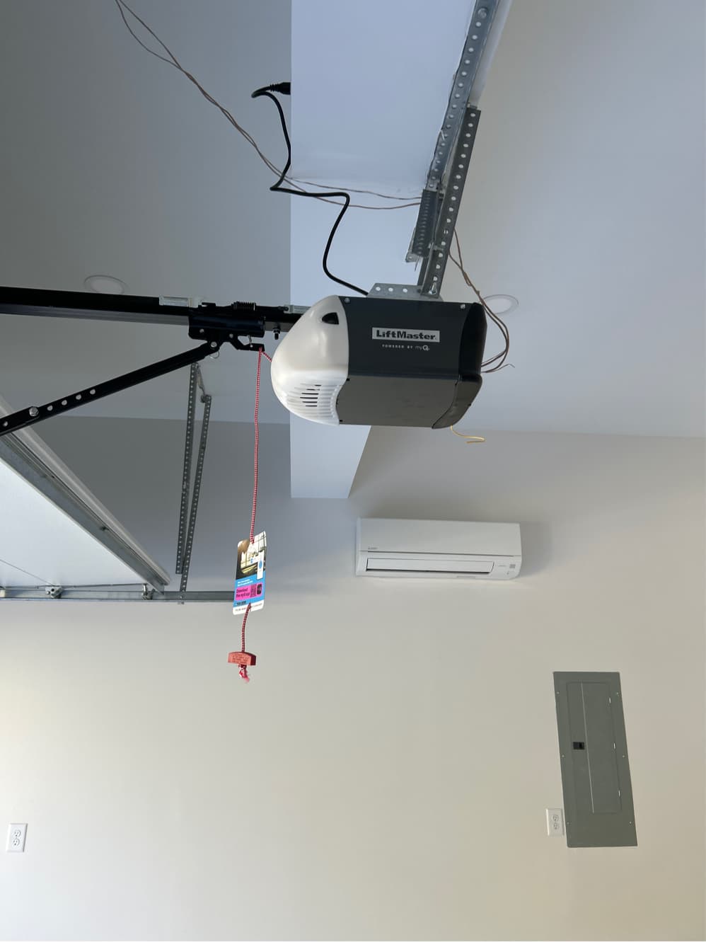 LiftMaster myQ smart garage door opener installed on ceiling rail