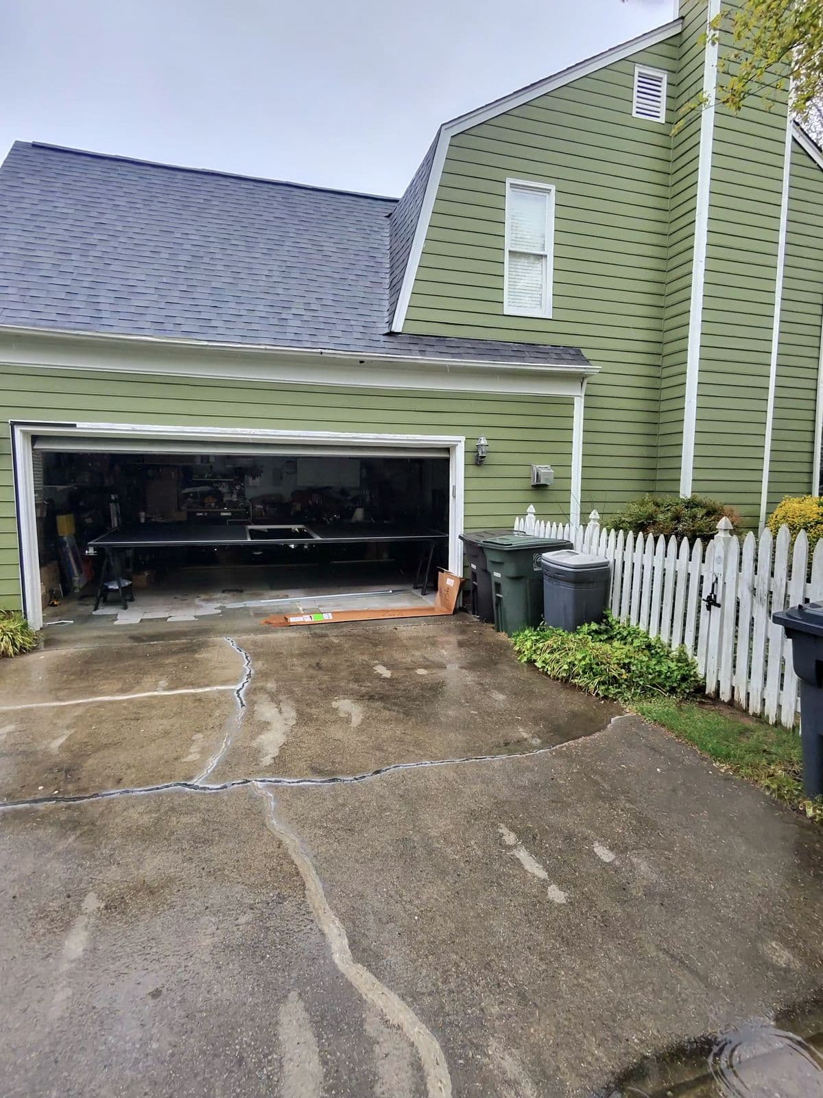 Exterior view of green house garage before screen installation in High Point NC
