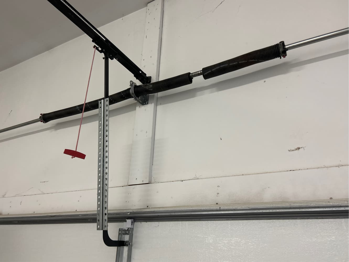 Broken torsion spring on garage door in Greensboro NC