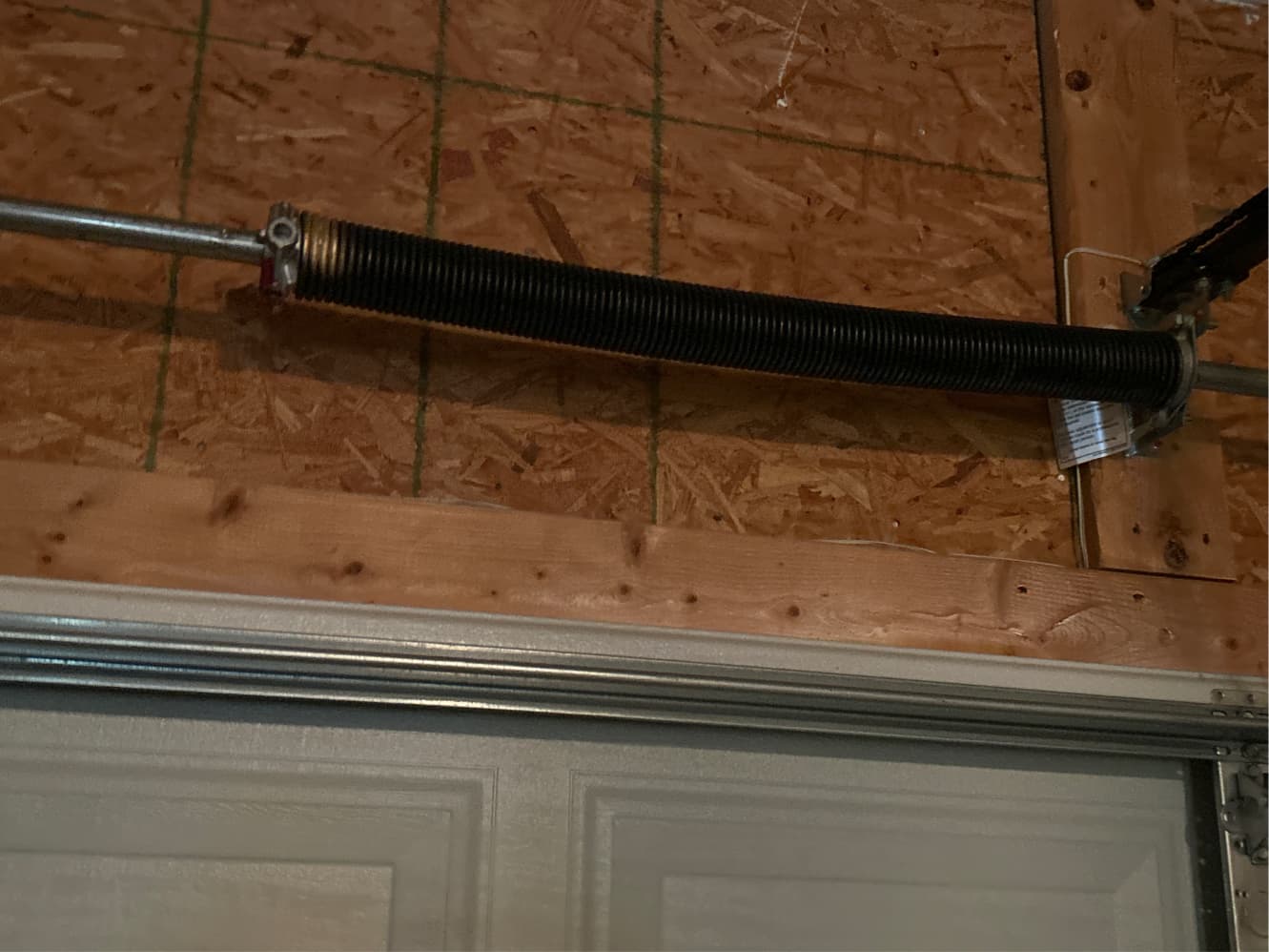 New torsion spring installed after emergency repair in Greensboro NC